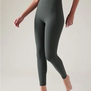 Athleta Salutation Stash pocket bali green tight